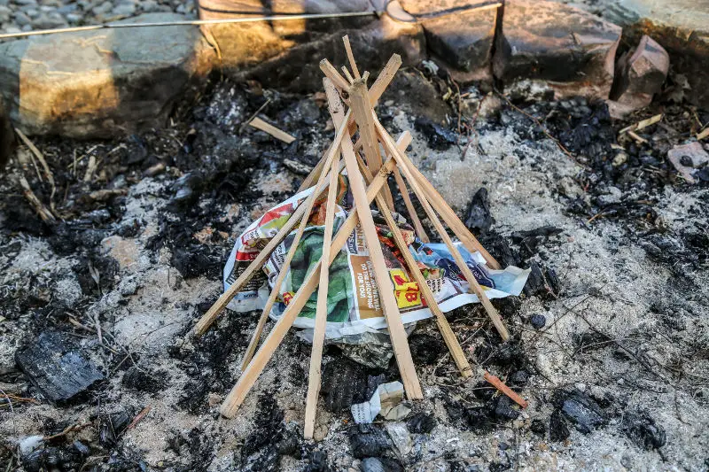 teepee campfire with newspaper tinder